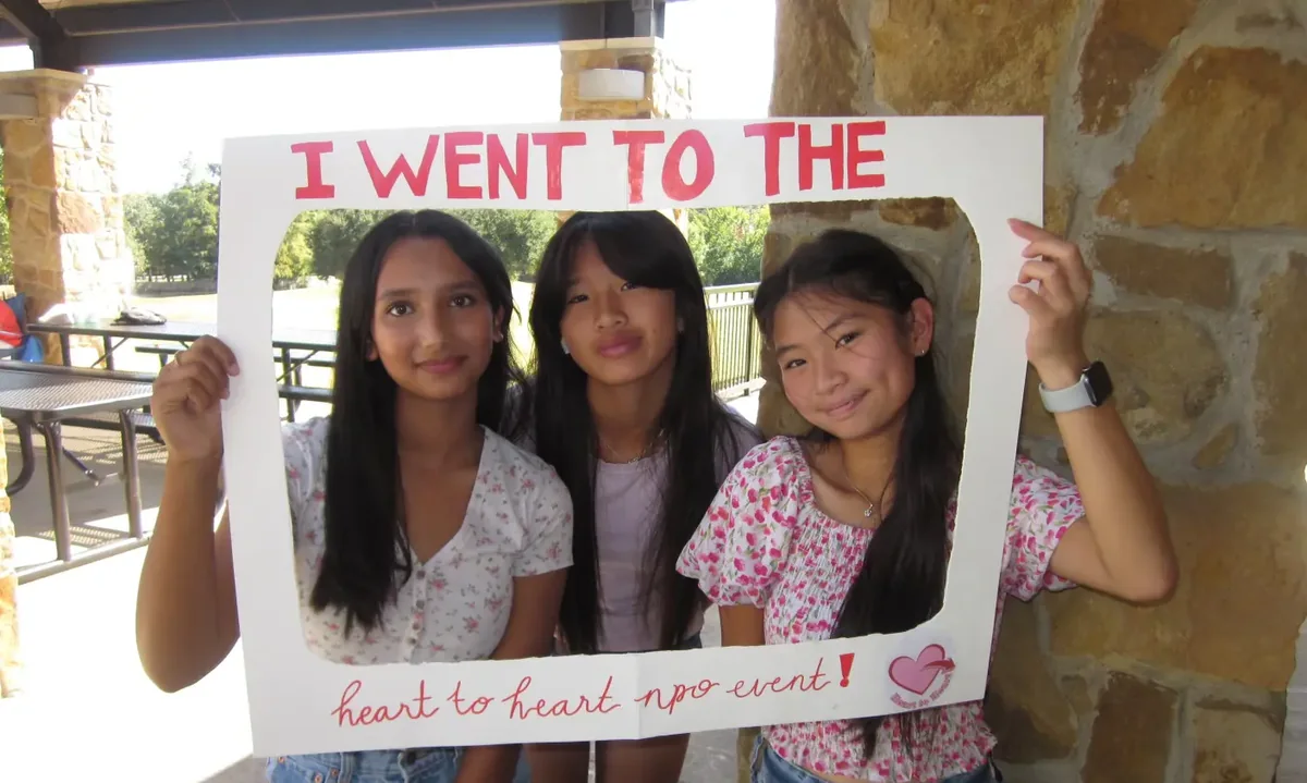 Student volunteers at a Heart to Heart community event.